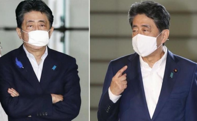 رئيس وزراء اليابان يخلع كمامة مثيرة للجدل