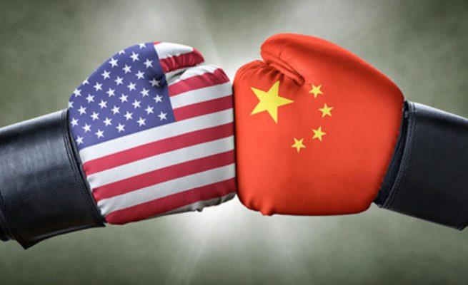 واشنطن تتهم صينيين بقرصنة أبحاث متعلقة بـ «كوفيد-19»